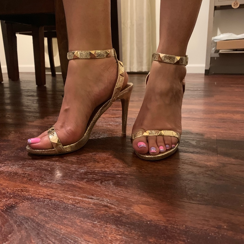 High heel metallic gold sandal....